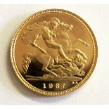 A 20TH CENTURY 22CT GOLD HALF SOVEREIGN With George and the Dragon depiction to one side and Queen