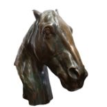 AFTER ALFRED HINRICH HUSSMAN, 1874 - 1946, A BRONZE CLAD HORSES HEAD. (28cm x 31cm) Condition: