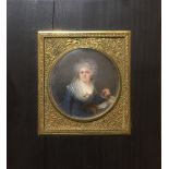 A 19TH CENTURY PORTRAIT MINIATURE Distinguished lady with music book, framed and glazed, the frame