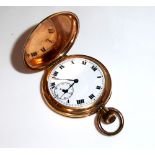 A GOLD PLATED FULL HUNTER POCKET WATCH The white enamelled dial with Roman numeral chapter ring
