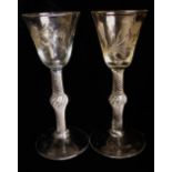 A PAIR OF GEORGIAN GLASS CORDIAL GLASSES With etched decoration depicting flowers and insects,