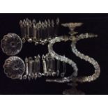 A PAIR OF VICTORIAN CUT CRYSTAL GAS WALL LIGHTS Having floral cast metal mounts, cut glass arms