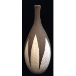 A 20TH CENTURY SWEDISH STUDIO ART POTTERY TAPERING VASE With incised leaf decoration on a brown