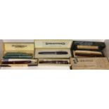 A COLLECTION OF VINTAGE FOUNTAIN PENS To include a purple tone Conway Stewart pen, a Parker Duofold,