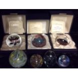 A COLLECTION OF VINTAGE GLASS PAPERWEIGHTS Three limited edition by Caithness 'Nocturne', 'Nucleus',