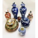 A SELECTION OF ORIENTAL CERAMICS To include a pair of blue and white lidded vases having Dog of Fo