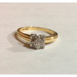 A VINTAGE 18CT GOLD AND DIAMOND CLUSTER RING Having a central round cut diamond set with diamonds to