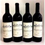 FOUR BOTTLES OF VINTAGE RED WINE Château Tronquoy Lalande Saint-Estèphe,1996, having a black cap and