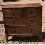 AN EARLY VICTORIAN MAHOGANY AND LINE INLAID CHEST Of two short above two long drawers. (88cm x