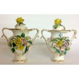 A PAIR OF 20TH CENTURY COALBROOKDALE STYLE PORCELAIN VASES Each having twin handles with gilt