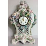 SAMPSON, A 19TH CENTURY FRENCH PORCELAIN BALUSTER MANTEL CLOCK With Rococo style decoration of