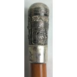 A 19TH CENTURY CHINESE SILVER AND MALACA WALKING STICK The silver handle embossed with figures and