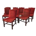A SET OF EIGHT GEORGE III STYLE DINING CHAIRS In red velvet upholstery, raised on square legs.