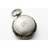 NATHANIEL MILLS, A GEORGIAN SILVER CIRCULAR VINAIGRETTE With embossed floral decoration to edge