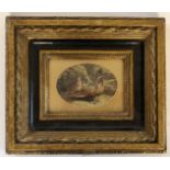 AN OVAL PRINT Pheasants, glazed and in a heavy decorative frame. (34cm x 30cm)