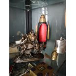 A SELECTION OF BRASS AND METALWARE ITEMS To include; a piece of Soviet trench art; a bronzed Spelter