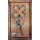 A 20TH CENTURY DEPICTION OF A FOUR LEAF CLOVER COMPRISED OF WELDED HORSESHOES Mounted on a framed