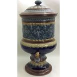A LARGE VICTORIAN DOULTON STONEWARE BALUSTER WATER FILTER With a circular lid, having incised floral