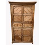A 19TH CENTURY DUTCH PINE CUPBOARD With an arrangement of four cupboards and central drawers.