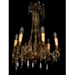 A 19TH CENTURY GLASS AND BRONZE FIVE BRANCH CHANDELIER Hung with crystal prisms and beads. (70cm)
