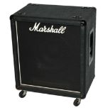 A MARSHALL 1550 1 X 15 BASS SPEAKER The black cabinet with castors and carry handles.