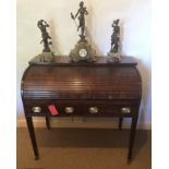 A GEORGE III PERIOD MAHOGANY TAMBOUR CYLINDER DESK The roll top enclosing a fitted interior with