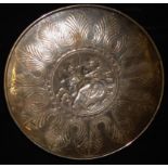 AFTER THE ANTIQUE, A GRECIAN SILVER PLATE ON COPPER CHARGER/DISH With engraved acanthus leaf