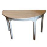 A PAIR OF 19TH CENTURY FRENCH GREY DEMILUNE HALL TABLES Raised on square chamfered legs. (102cm x