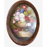 E.M. BALL, A 20TH CENTURY OVAL OIL ON BOARD Still life study of a floral bouquet, signed to base and