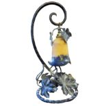 A 20TH CENTURY ORGANIC FORM LAMP Applied with vine leaf and grape decoration, complete with tulip