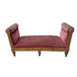 A 19TH CENTURY FRENCH VELVET UPHOLSTERED CONCAVE GILTWOOD DAYBED Carved with swags and rosette and