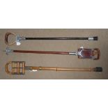 THREE VINTAGE SHOOTING STICKS To include one bamboo example. (h 82cm)