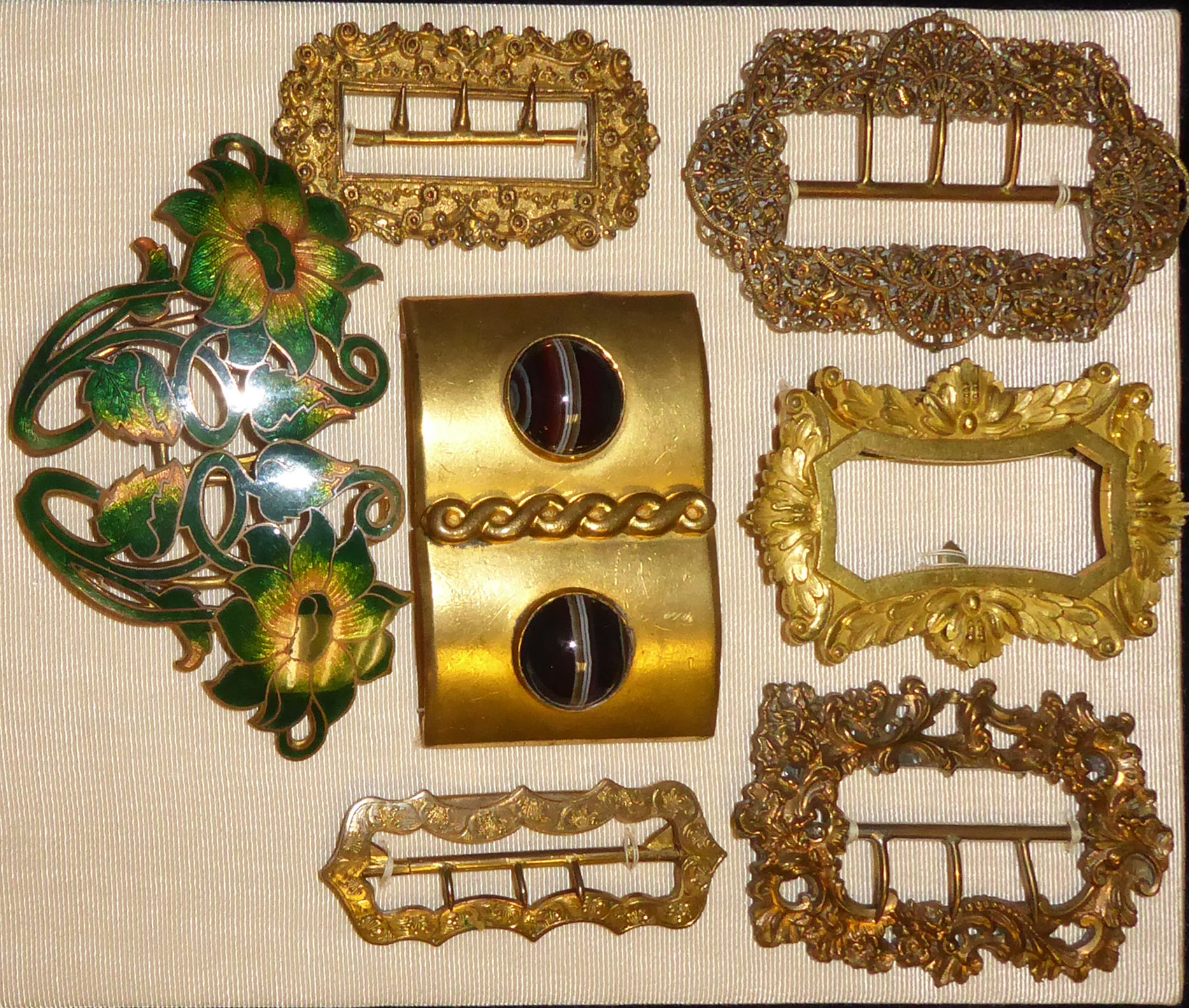 A COLLECTION OF 19TH CENTURY GILT BRASS RECTANGULAR BUCKLES With engraved decoration, a pair set