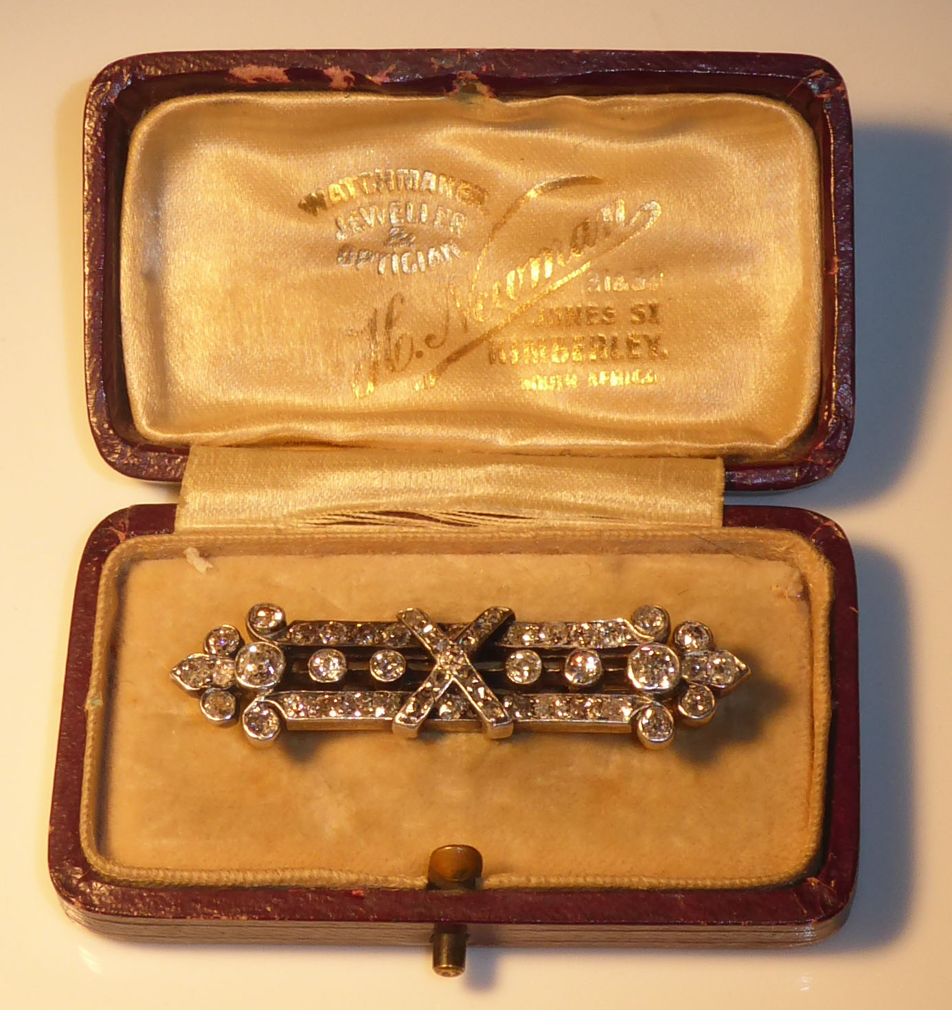 A YELLOW AND WHITE METAL DIAMOND BAR BROOCH Set with approximately 49 round cut diamonds. - Image 2 of 3