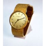 VACHERON & CONSTANTIN, GENEVE, AN 18CT GOLD LADIES' WRISTWATCH Having a plain circular dial and