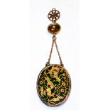 AN INDIAN YELLOW METAL AND GEM SET OVAL PENDANT Inlaid and engraved with a hunting scene and foliate