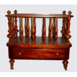 A VICTORIAN MAHOGANY CANTERBURY With spindle rails and a lower drawer. (50cm x 31cm x 43cm)