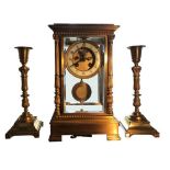 MARTI ET CIE, PARIS, A 19TH CENTURY GILT BRASS CLOCK GARNITURE SET The mantel clock set with four