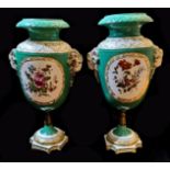 A PAIR OF 19TH CENTURY CONTINENTAL PORCELAIN BALUSTER VASES With applied rams heads and hand painted