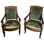 A PAIR OF EARLY FRENCH LOUIS PHILIPPE MAHOGANY ARMCHAIRS, CIRCA 1830 With carved scrolling arms