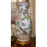 A LATE 19TH CENTURY CHINESE FAMILLE ROSE VASE Decorated with peaches. (h 45cm)