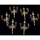 A SET OF SIX 19TH CENTURY GILT BRONZE WALL SCONCES With acorn finial, pierced mid section and swag