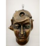 A 20TH CENTURY BRONZE BUST OF A STYLIZED LADY Modelled as the character 'Replicant Maria' from the