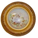 A PAIR OF 19TH CENTURY BISQUE PORCELAIN PLAQUES With scenes of a mother, children and an elderly