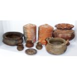 A COLLECTION OF ORIENTAL TERRACOTTA POTTERY ITEMS Two cylindrical storage jars, a vase with