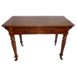 A 19TH CENTURY MAHOGANY SIDE TABLE Having a short single drawer, raised on turned legs on