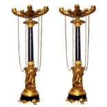 A FINE PAIR OF 19TH CENTURY EMPIRE GILT BRONZE FIVE BRANCH CANDELABRAS The moulded sconces of oil