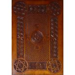 AN EARLY 20TH CENTURY JEWISH POSTCARD ALBUM Heavily carved 'Star of David' roundels and geometric