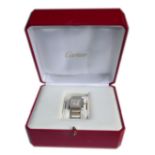 CARTIER, A LADIES' TANK WRISTWATCH The square dial with Roman numeral chapter ring, complete with