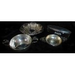 A COLLECTION OF VINTAGE SILVER WARE Comprising a twin handled tea strainer, hallmarked 1946, a